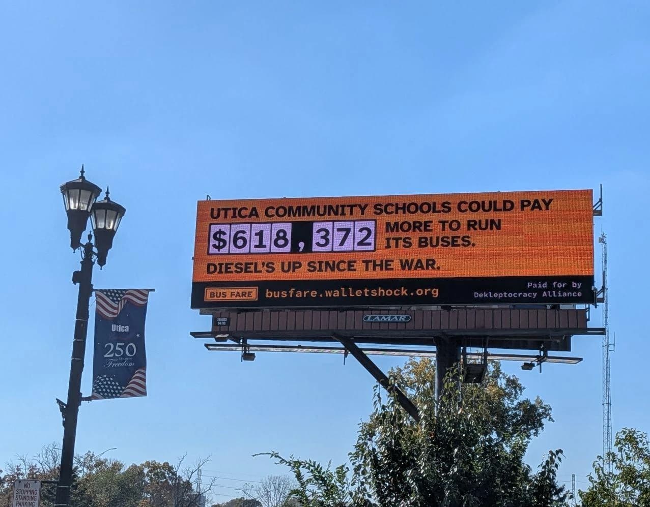 Bus Fare billboard in Utica, Michigan: Utica Community Schools could pay $618,372 more to run its buses. Diesel's up since the war.